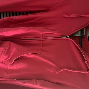 I’m selling a pink jacket size :small brand : Champion